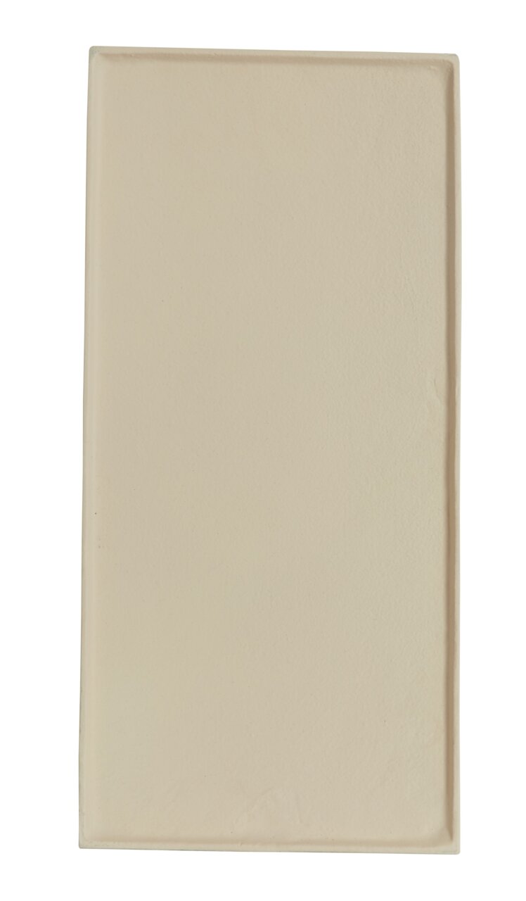 Rechteckige, beige Schale aus Keramik, von oben betrachtet.