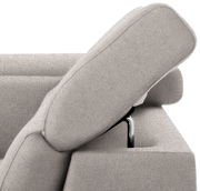 Nahaufnahme einer grauen Rundecke mit verstellbarer Kopfstütze, seitliche Perspektive