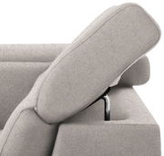 Nahaufnahme einer grauen Rundecke mit verstellbarer Kopfstütze, seitliche Perspektive