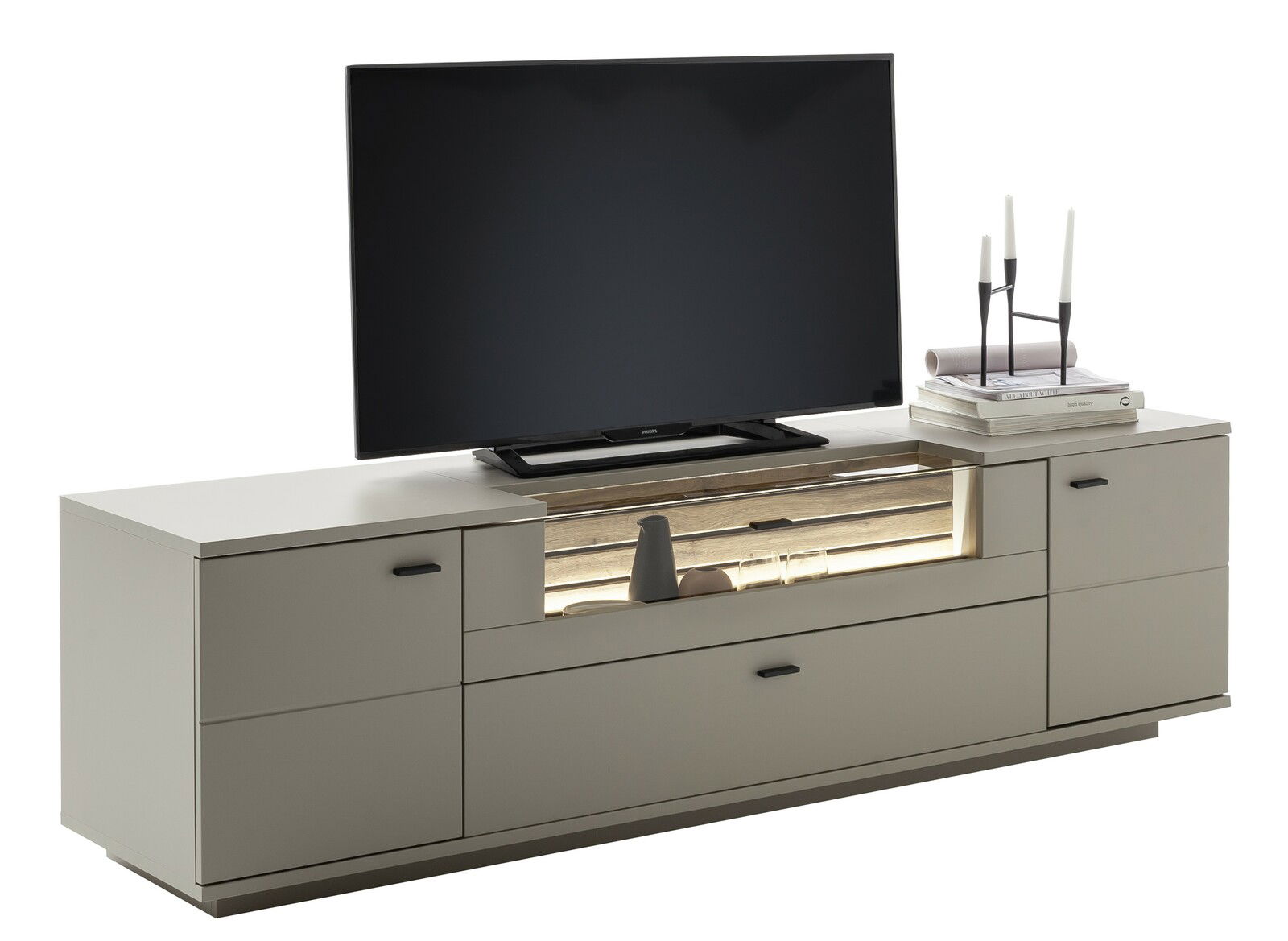 TV-Element in moderner, minimalistischer Optik mit Stauraum und Dekoration, seitliche Perspektive