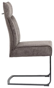 Seitenansicht eines modernen Freischwingers mit grauem Stoffbezug und schwarzem Metallgestell.