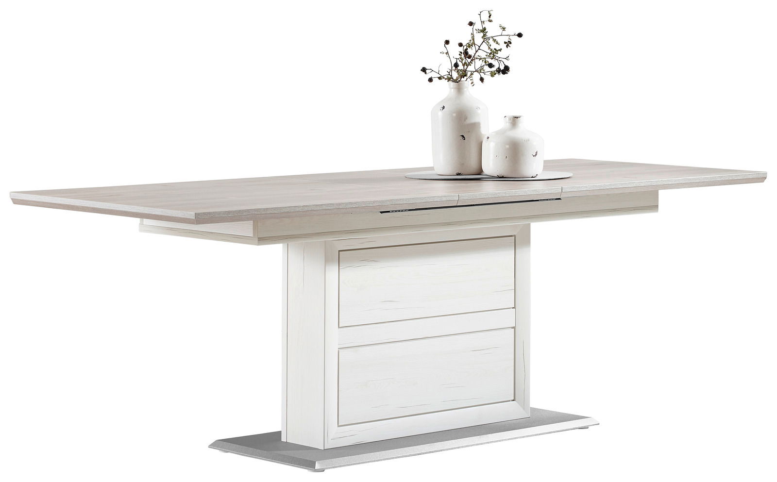 Moderner Funktions-Esstisch CAMRON in heller Holzoptik mit zentralem Standfuß, seitliche Perspektive, dekoriert mit zwei weißen Vasen.