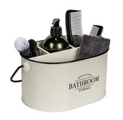 Ovale Badbox mit Griff, gefüllt mit Pflegeutensilien wie Bürsten, Seifenspender, Kamm und Handtuch, seitliche Perspektive