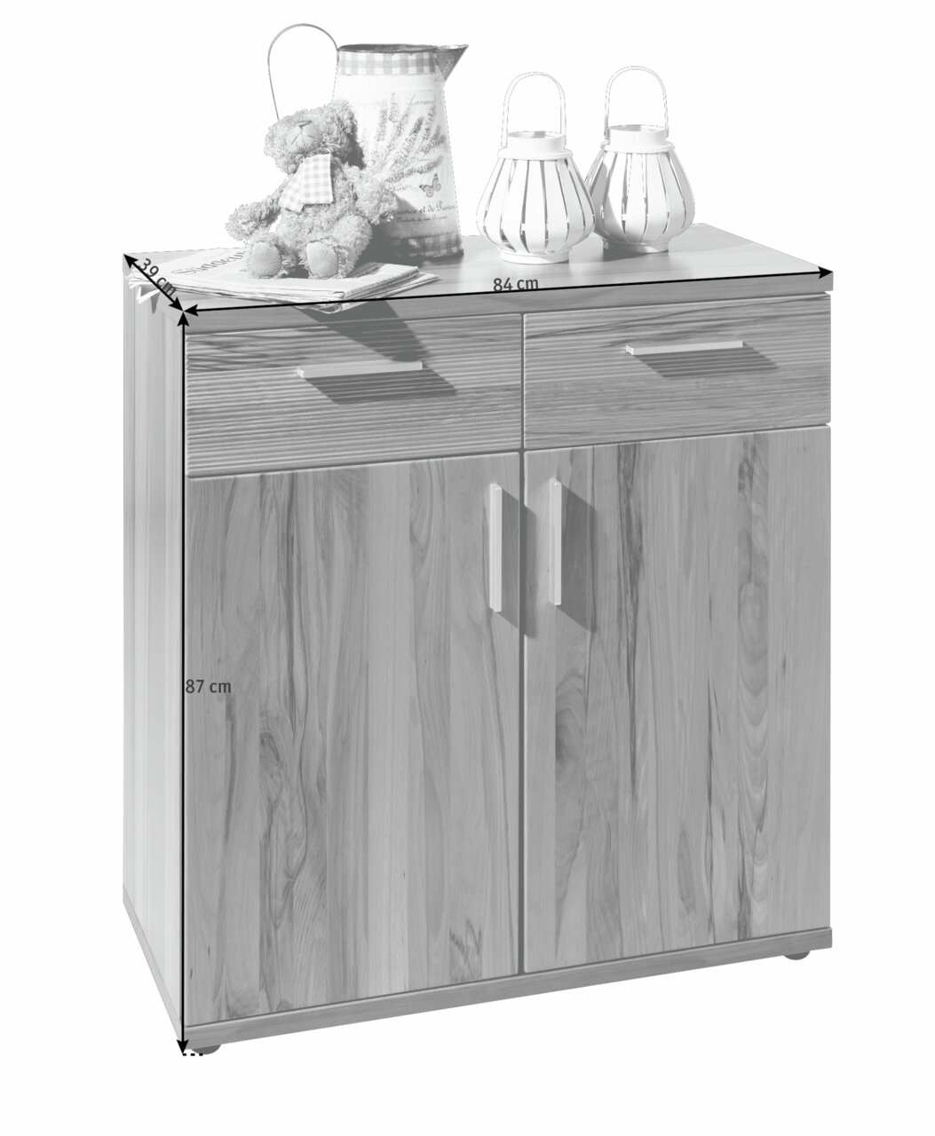 Kommode aus Holz mit zwei Schubladen und zwei Türen, dekoriert mit einem Teddybär, einer Kanne und zwei Laternen, frontal betrachtet.