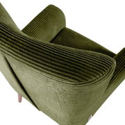 Olijfgroene corduroy fauteuil met brede armleuningen en een gestoffeerde rugleuning, schuin van achteren bovenaf gefotografeerd (3/4-aanzicht)
