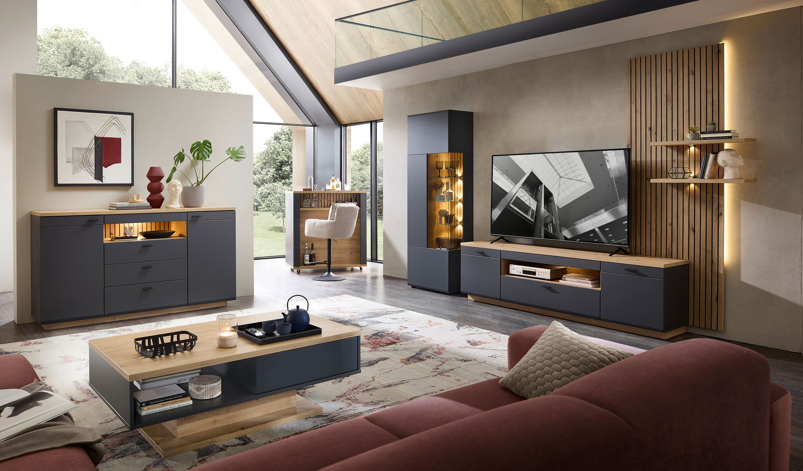 Stylife Wandkombination RENO Moderne Wohnzimmer-Wandkombination in dunklem Holz und Grau mit TV-Schrank, Vitrine und Regal, seitliche Perspektive.