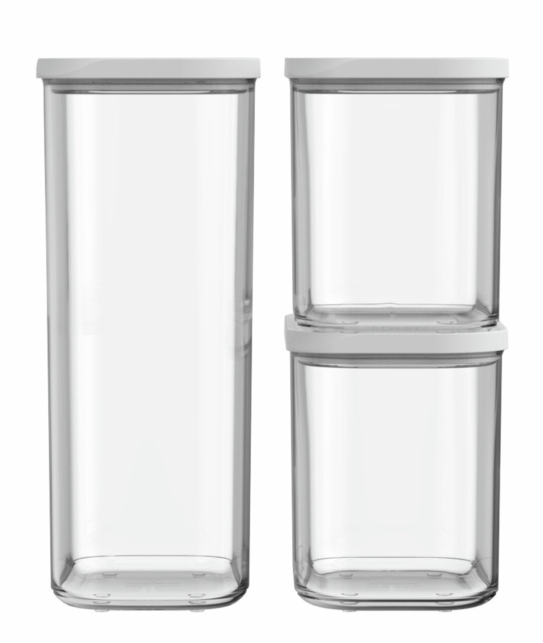 Drei transparente Vorratsbehälter mit weißen Deckeln, frontal betrachtet.