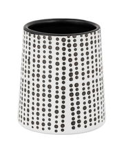 Zahnputzbecher in schwarz-weiß mit Punktmuster, seitliche Perspektive