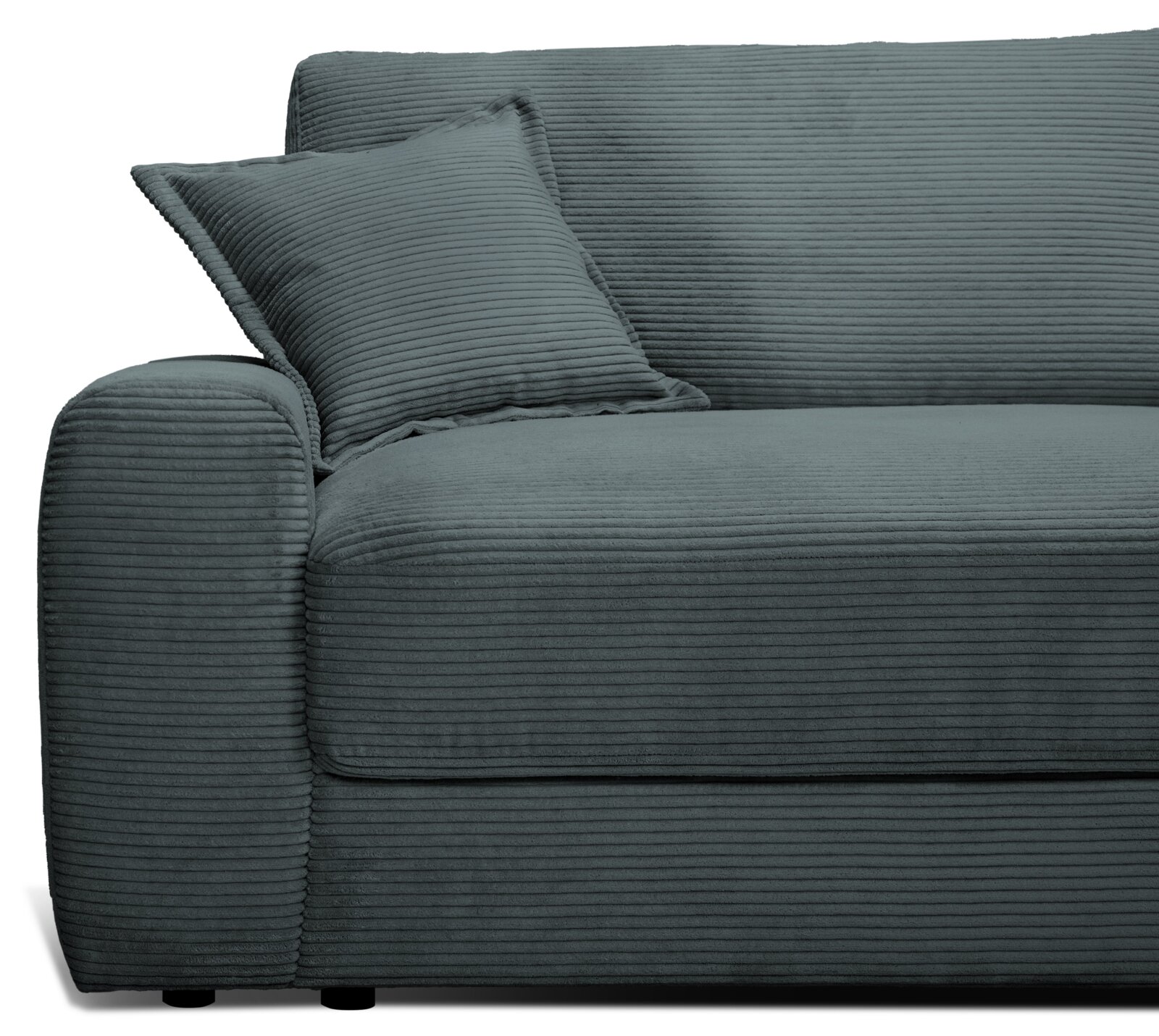 Großes Sofa in dunkelgrauem Cordstoff, seitliche Perspektive mit Kissen auf der linken Armlehne.