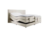 Boxspringbett mit verstellbaren Matratzen in seitlicher Perspektive