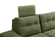 Grünes Sofa mit verstellbarer Kopfstütze, seitliche Perspektive