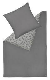 Graue Bettwäsche mit Kissenbezug, teilweise umgeschlagen, um das gemusterte Innere zu zeigen. Draufsicht.