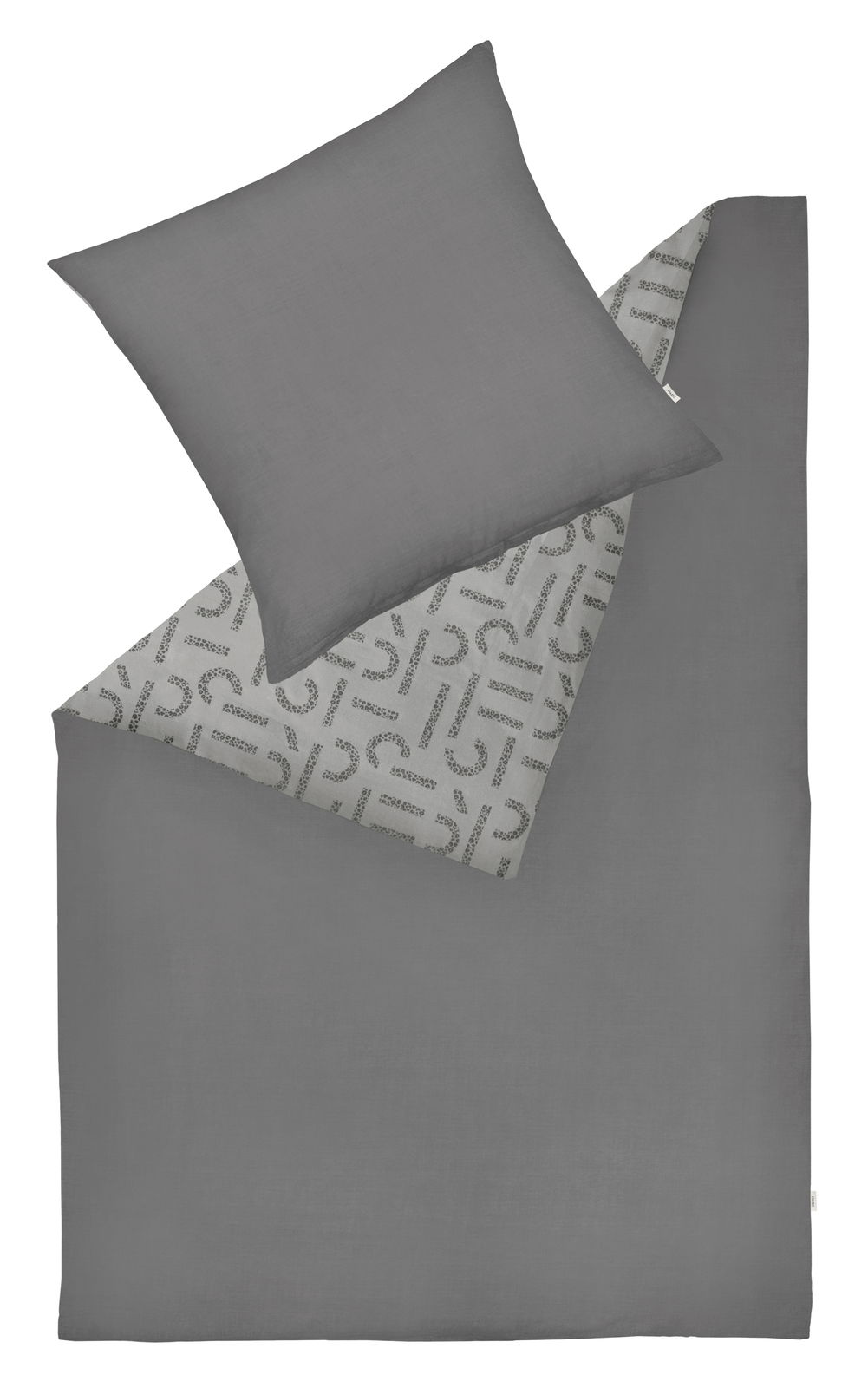 Graue Bettwäsche mit Kissenbezug, teilweise umgeschlagen, um das gemusterte Innere zu zeigen. Draufsicht.