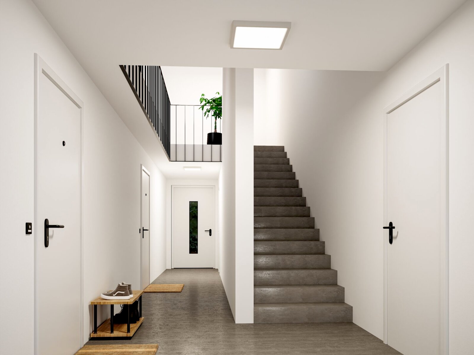 Modernes, helles Treppenhaus mit grauer Betontreppe, weißen Türen und schwarzem Geländer, Deckenleuchte und Pflanze im Obergeschoss; Perspektive: Frontalansicht aus dem Flur in Richtung Treppe.