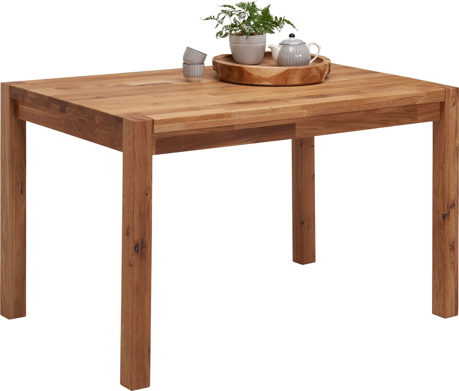 Holzesstisch mit rechteckiger Tischplatte, dekoriert mit einem Tablett, einer Teekanne und einer Pflanze, seitliche Perspektive