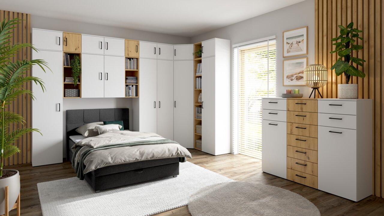 Carryhome Eckaufsatzschrank MULTISTAURAUM Moderne Schlafzimmermöbel mit weißem und holzfarbenem Design, bestehend aus einem Eckschrank, Regalen und einer Kommode, aus der Perspektive des Betrachters von vorne rechts.