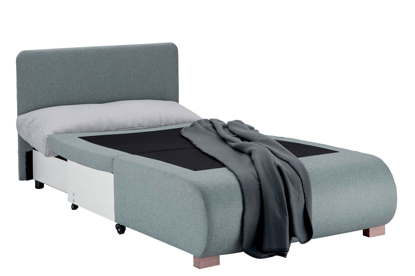 Funktionssessel in Bettposition mit grauem Stoffbezug, Kissen und Decke, seitliche Perspektive