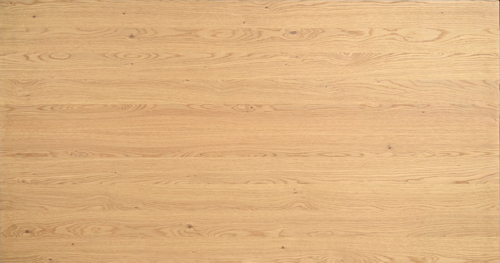 Dieter Knoll Eettafel JAKOB Bovenaanzicht van een tafelblad van licht hout met zichtbare nerf.