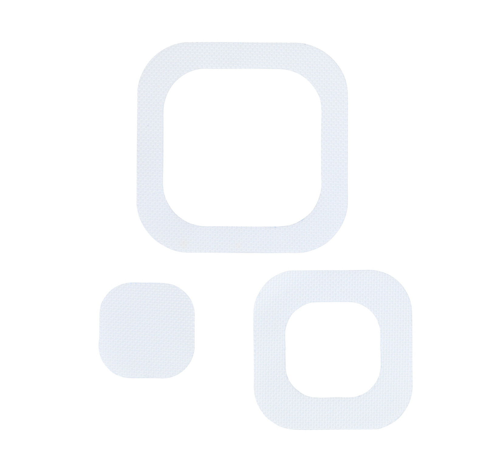 Drei weiße, eckige Anti-Rutschsticker in verschiedenen Größen, von oben betrachtet.