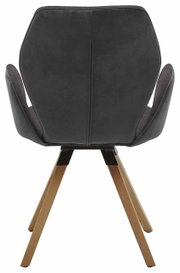 Achterkant van een moderne fauteuil met donkere bekleding en houten poten
