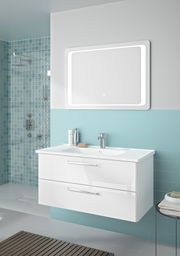 Moderner Badblock mit zwei Schubladen und integriertem Waschbecken, frontal betrachtet, vor einer Wand mit blauen Fliesen.