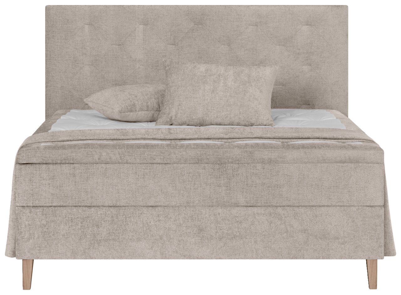 Frontale Ansicht eines beigen Boxspringbetts mit Kopfteil und zwei Kissen.