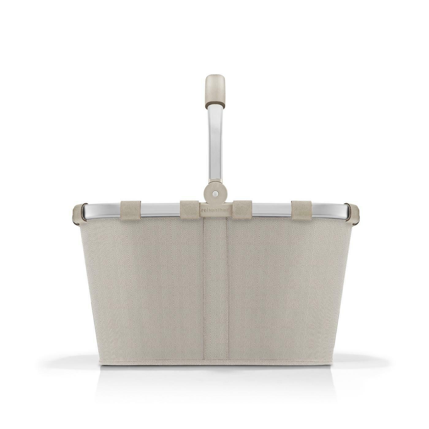 Frontansicht eines sandfarbenen Carrybags mit Herringbone-Muster und Aluminiumgriff.