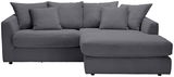Graues Ecksofa mit mehreren Kissen, Vorderansicht