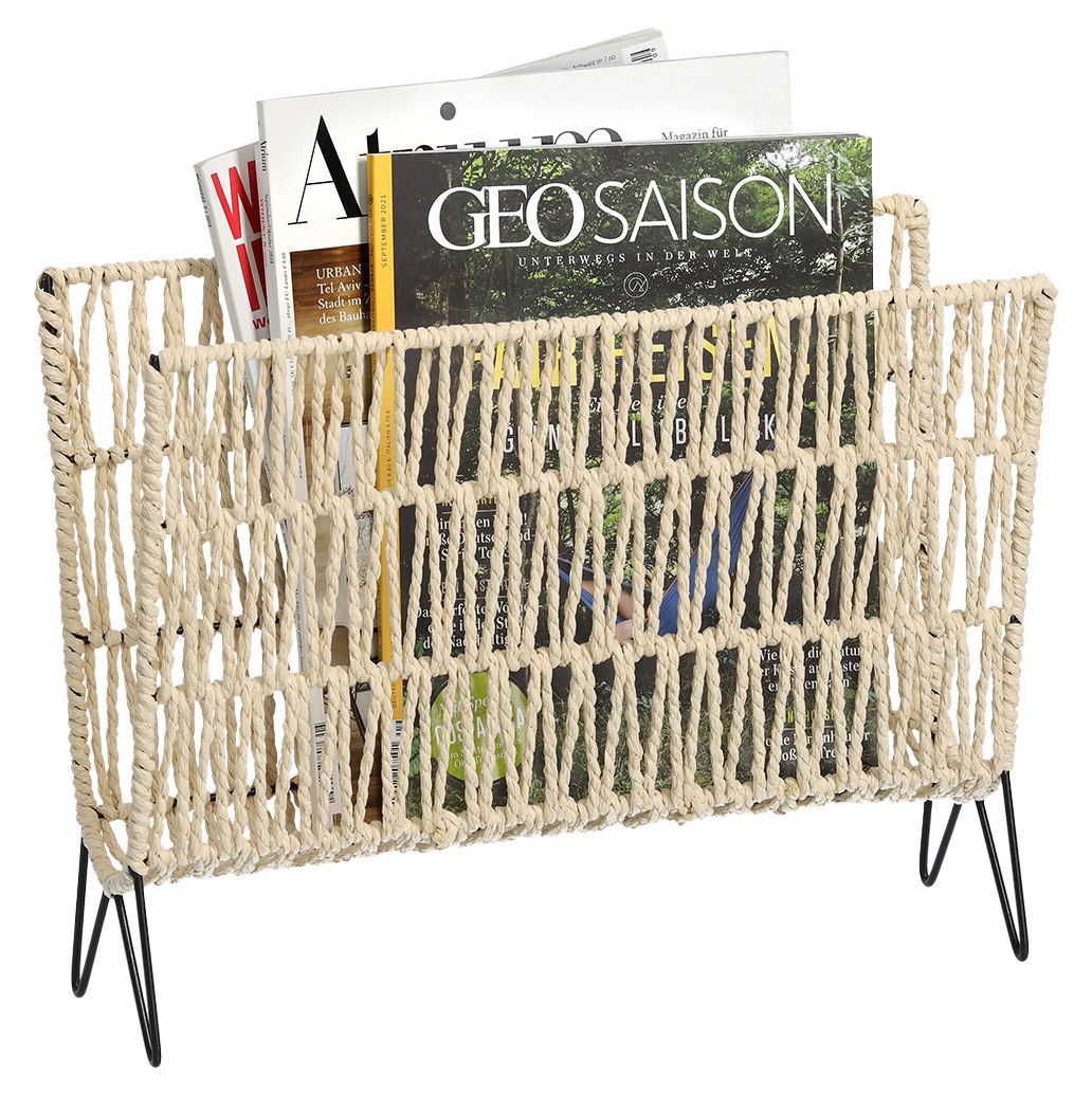 Zeitungsständer aus geflochtenem Material mit Metallbeinen, gefüllt mit Zeitschriften, seitliche Perspektive