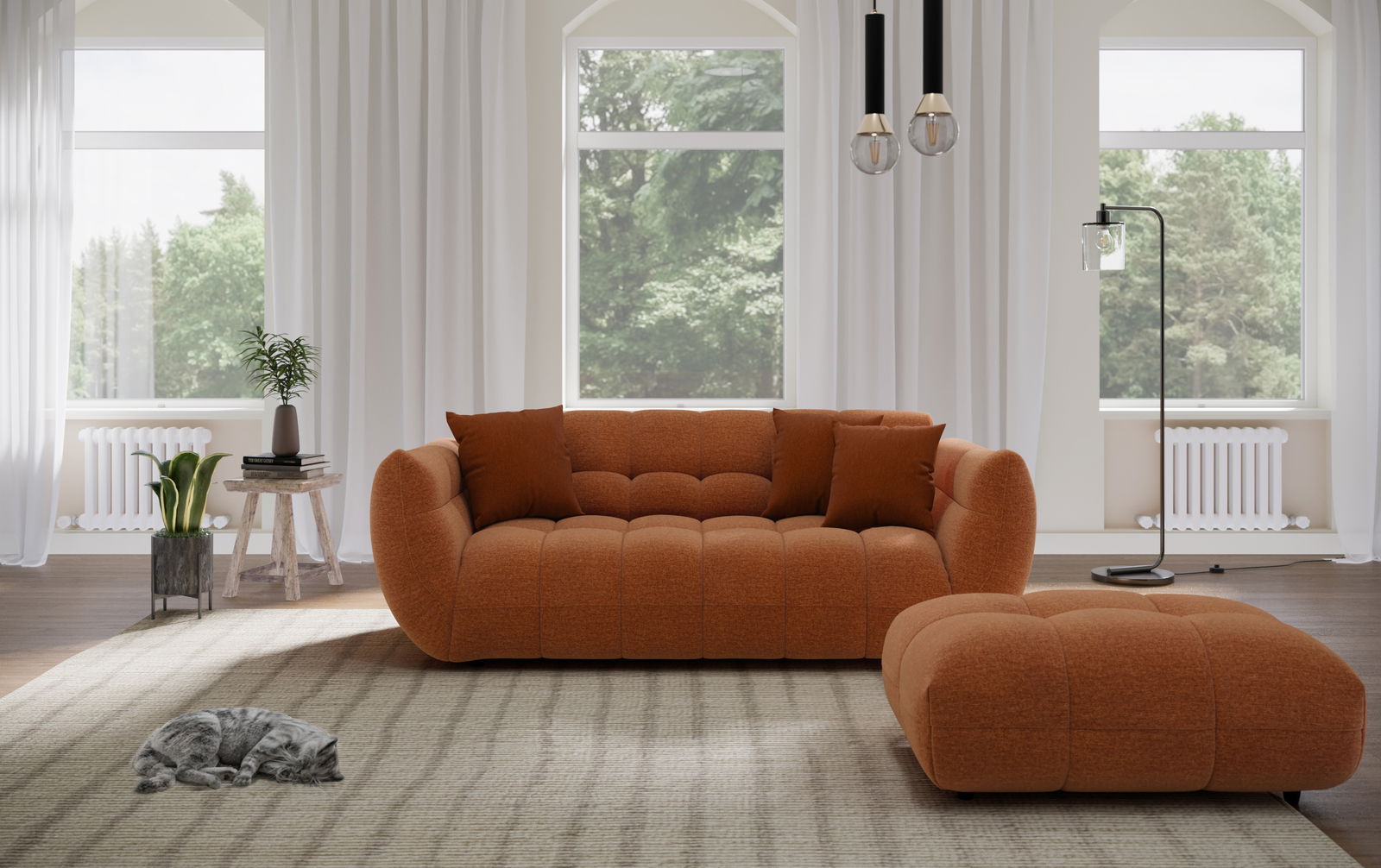 Lounge Handmade Big Sofa Gemütliches Big-Sofa in warmem Orange, frontal fotografiert, mit passendem Hocker in einem hellen, modernen Wohnzimmer.