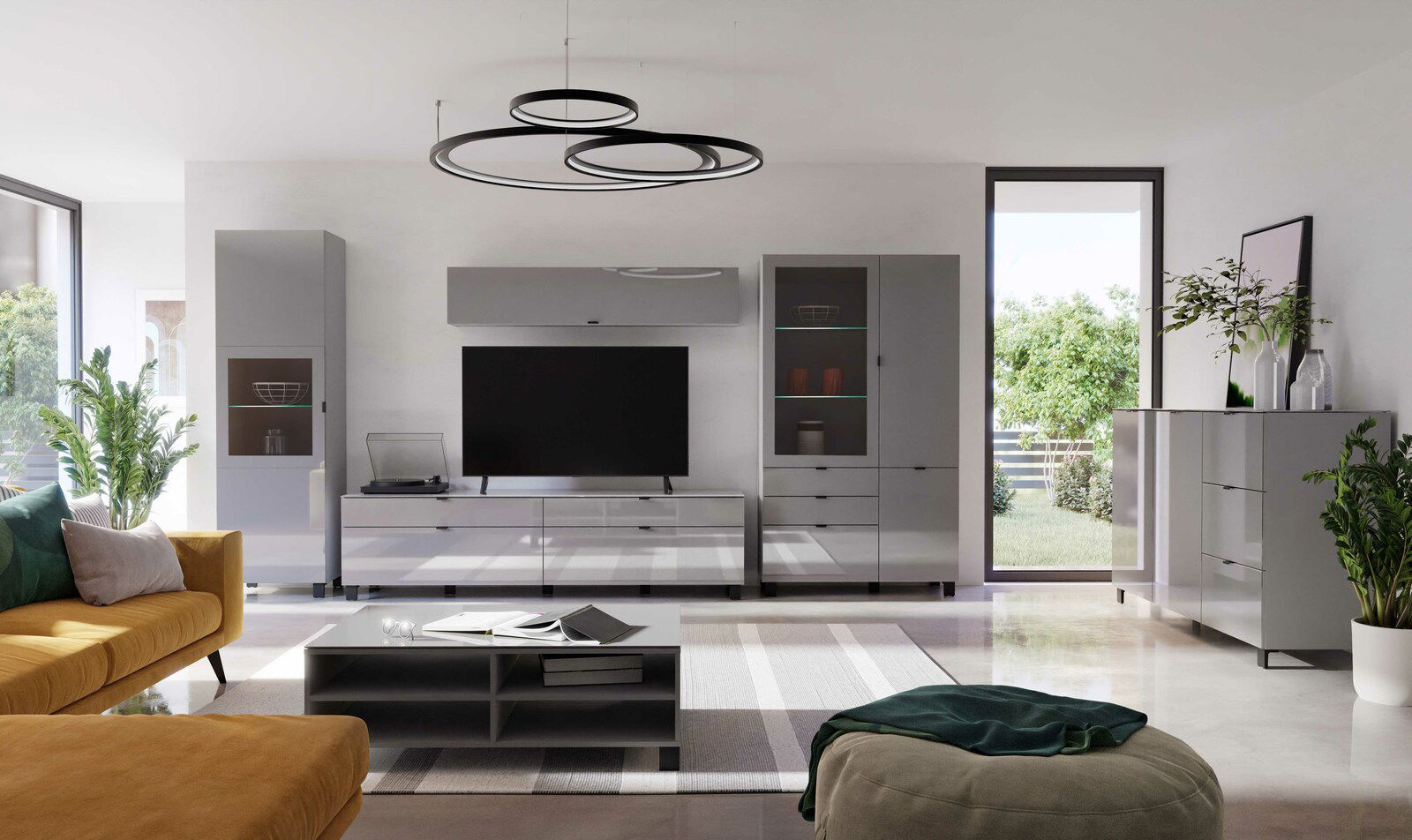 Modernes Wohnzimmer mit grauem TV-Lowboard, Hängeschrank und Vitrine, seitliche Perspektive.