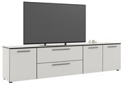 Frontansicht eines weißen XL-TV-Lowboards mit zwei Schubladen und vier Türen, darauf steht ein großer Flachbildfernseher.