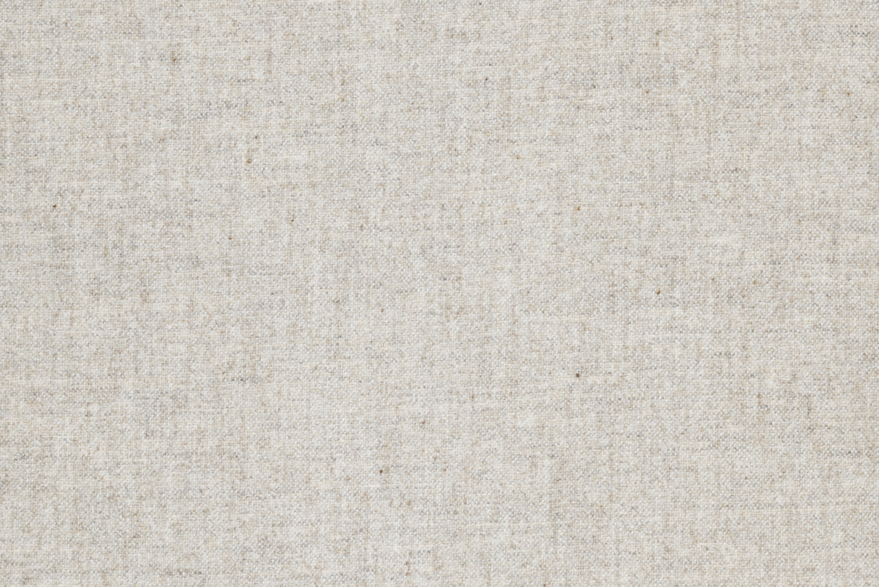 Nahaufnahme eines hellgrauen Stoffes mit feiner Textur, Draufsicht