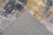 Teppich mit abstraktem Muster in Grau- und Goldtönen, Detailansicht der Vorder- und Rückseite.