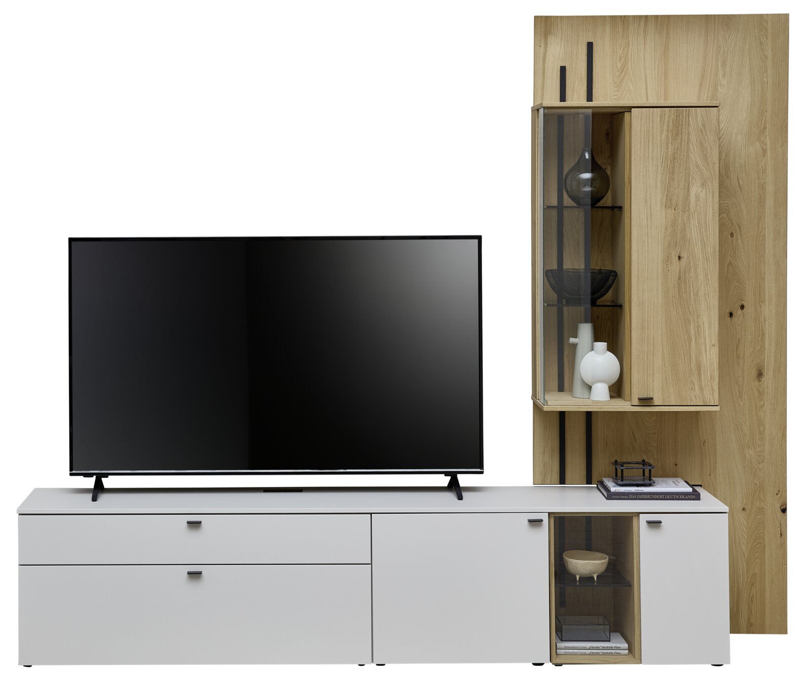 Moderne Wandkombination Venjakob VANYA in hellem Holz und Weiß, bestehend aus einem TV-Board mit Schubladen und einem hohen Schrank mit Glastüren, frontal abgebildet.