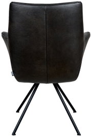 Achterkant van een zwarte fauteuil met metalen poten, model Chester van Dieter Knoll.