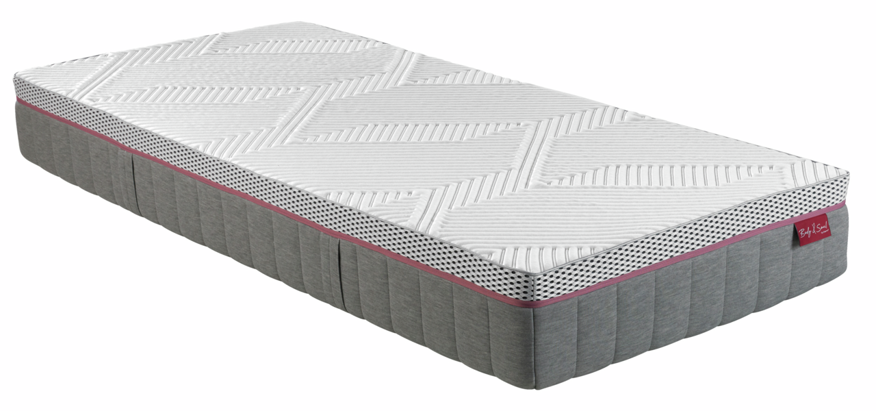 irisette Matratze medium BODY&SOUL Matratze 90x200 MEDIUM in seitlicher Perspektive mit grauem und weißem Design, gepunktetem Rand und rotem Etikett.