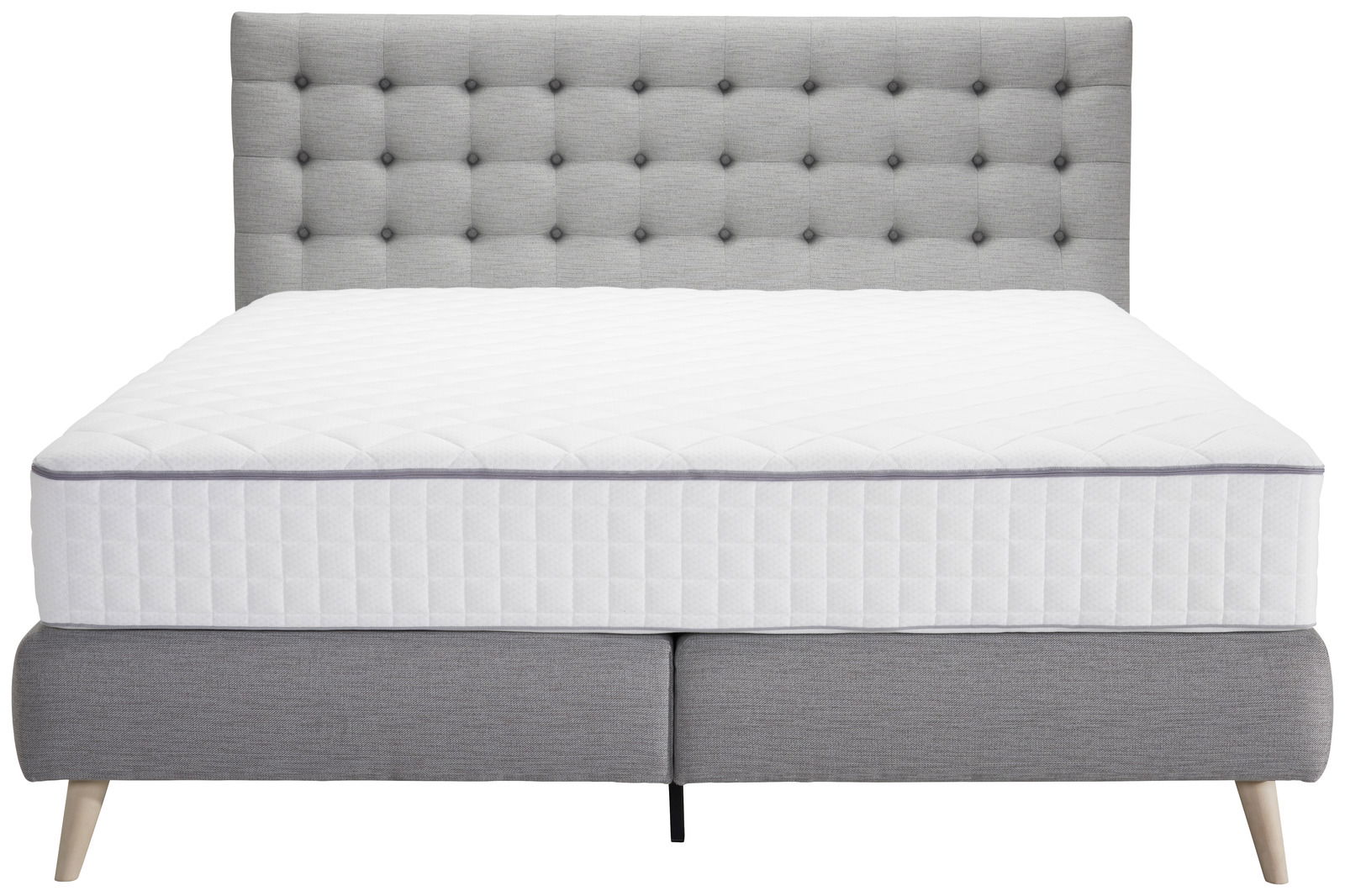 Frontale Ansicht eines grauen Boxspringbetts mit gestepptem Kopfteil und weißer Matratze.