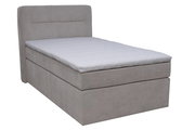 Boxspringbett in seitlicher Perspektive mit grauem Stoffbezug und weißer Matratze
