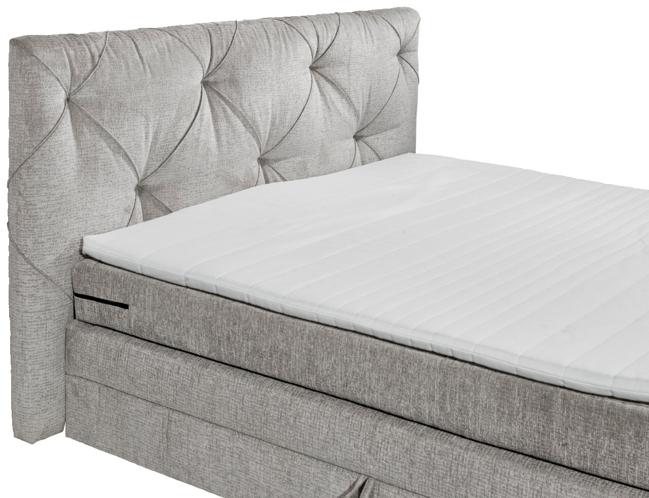 Boxspringbett mit gepolstertem Kopfteil in seitlicher Perspektive