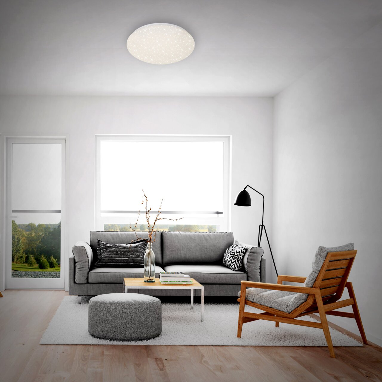 LED Sternenhimmel-Deckenleuchte in einem modernen Wohnzimmer, von unten betrachtet.