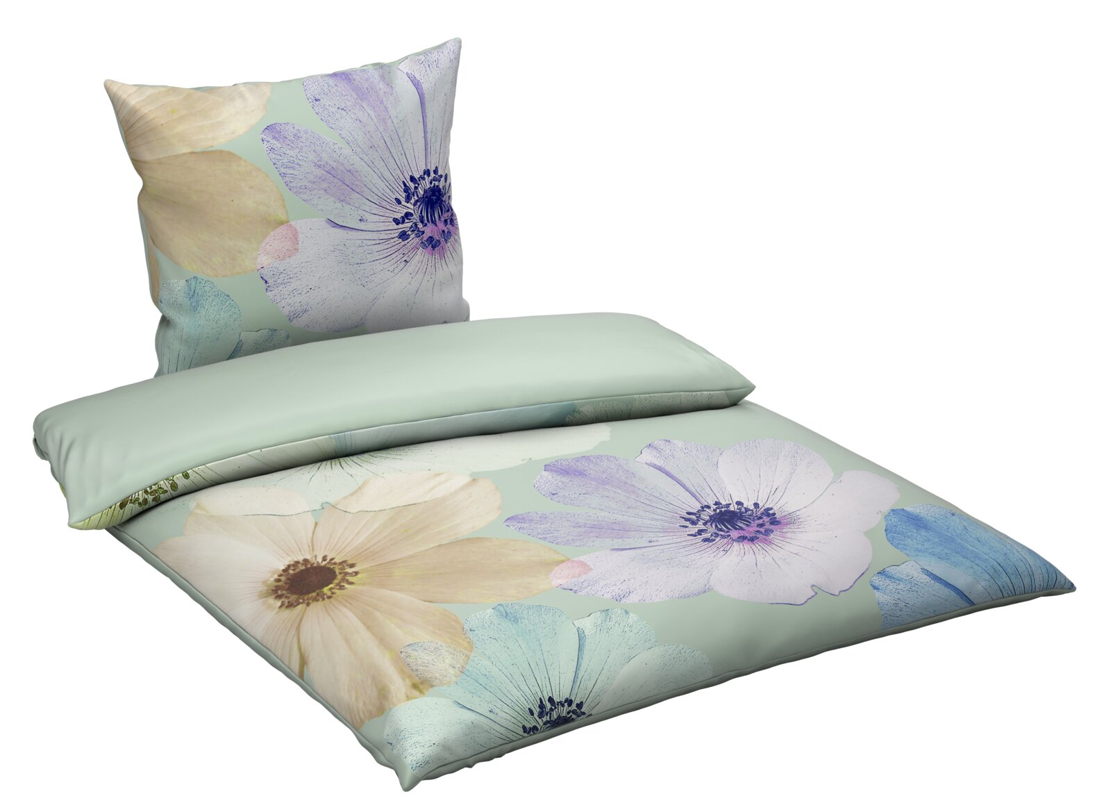 Omkeerbaar beddengoed met een groot bloemenpatroon in pastelkleuren, gezien vanuit een schuine hoek van bovenaf