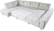 Großes, hellgraues Ecksofa in U-Form mit weichem Stoffbezug, von oben fotografiert.