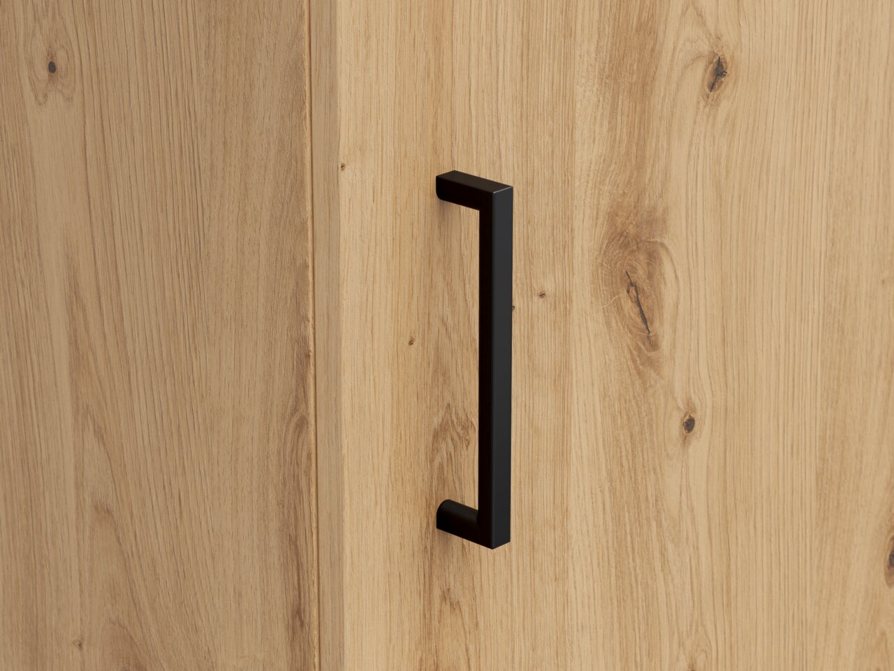 Nahaufnahme einer Holzkommode mit schwarzem Griff, seitliche Perspektive