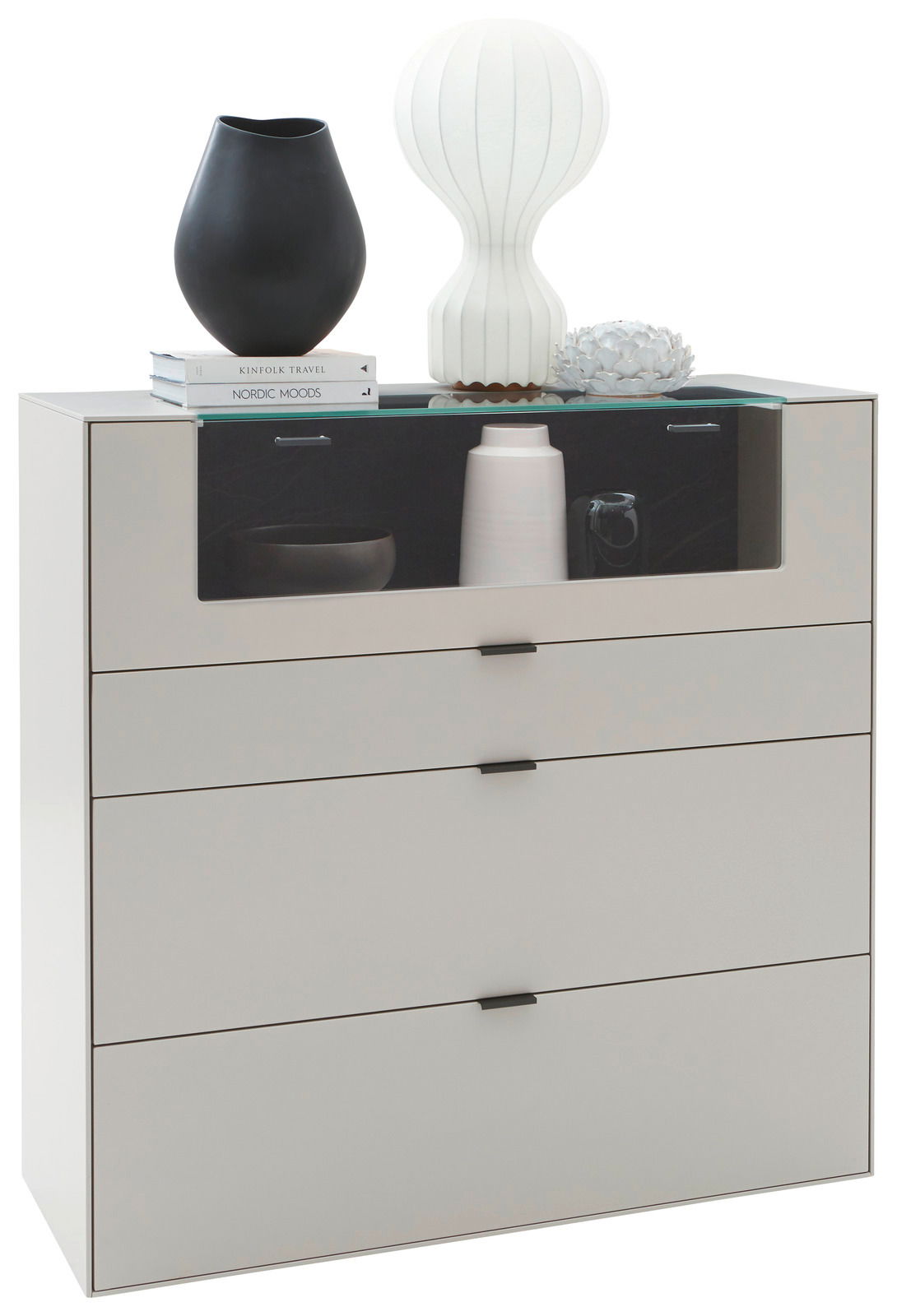 Dieter Knoll Hoogkast MONTESA Modernes Highboard mit vier Schubladen, dekoriert mit Vasen und Büchern, seitliche Perspektive