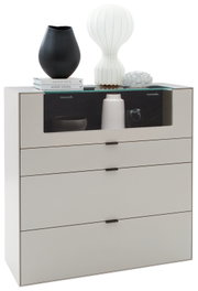 Modernes Highboard mit vier Schubladen, dekoriert mit Vasen und Büchern, seitliche Perspektive