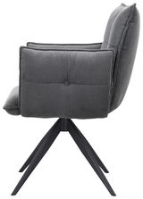 Seitenansicht eines grauen Armlehnstuhls mit gestepptem Stoffbezug und schwarzem Metallgestell.