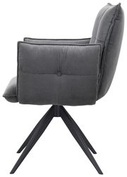 Seitenansicht eines grauen Armlehnstuhls mit gestepptem Stoffbezug und schwarzem Metallgestell.