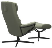 Grüner Einzelsessel mit Hocker, seitliche Perspektive