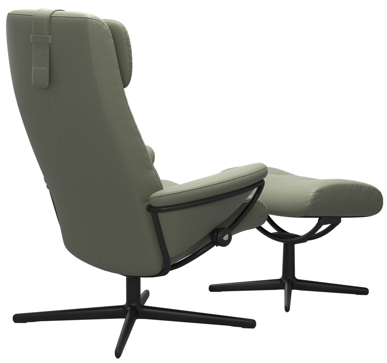 Groene fauteuil met bijzetkruk, zijaanzicht